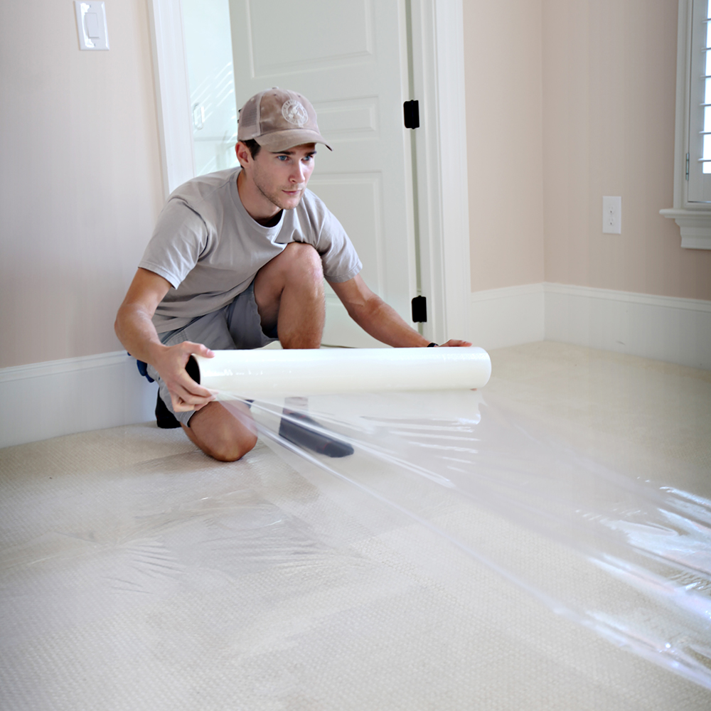 24" x 50' Trimaco 62450 Easy Mask Adhesive Backed Protective Carpet Film, 2-Mil - Image 4